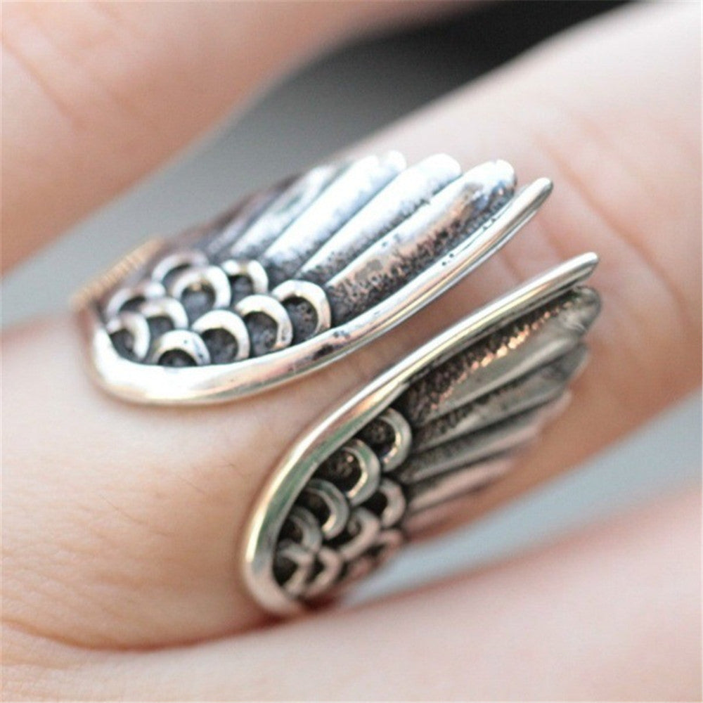 Angel wings ring black angel wings — in use