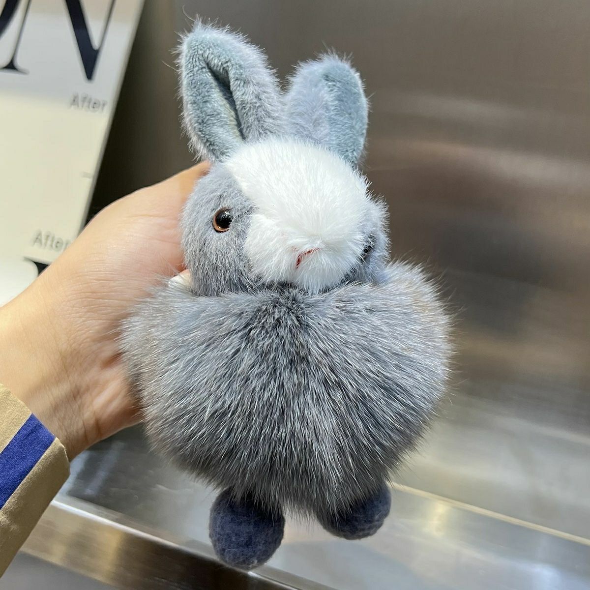Plush Doll Backpack Pendant — side view
