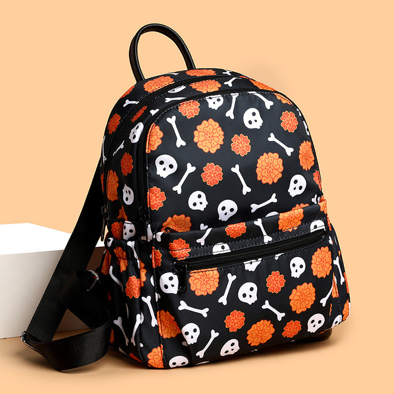 Halloween Bag Duo — Funny Pumpkin Crossbody Bag + Skull Print Waterproof Backpack — back view
