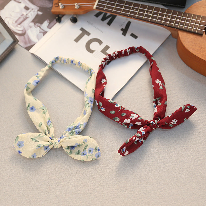 Big bow tie bunny ears headband — back view