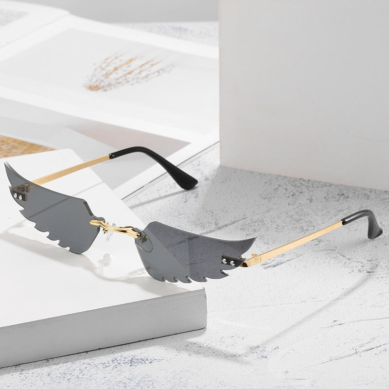 Angel wings sunglasses — scale reference