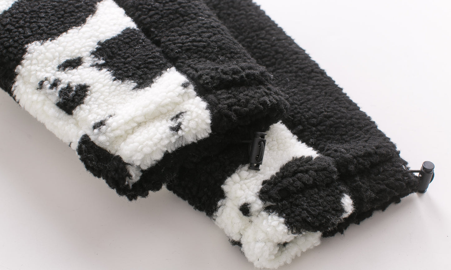 Cow pattern road plush padded cotton clothing — scale reference