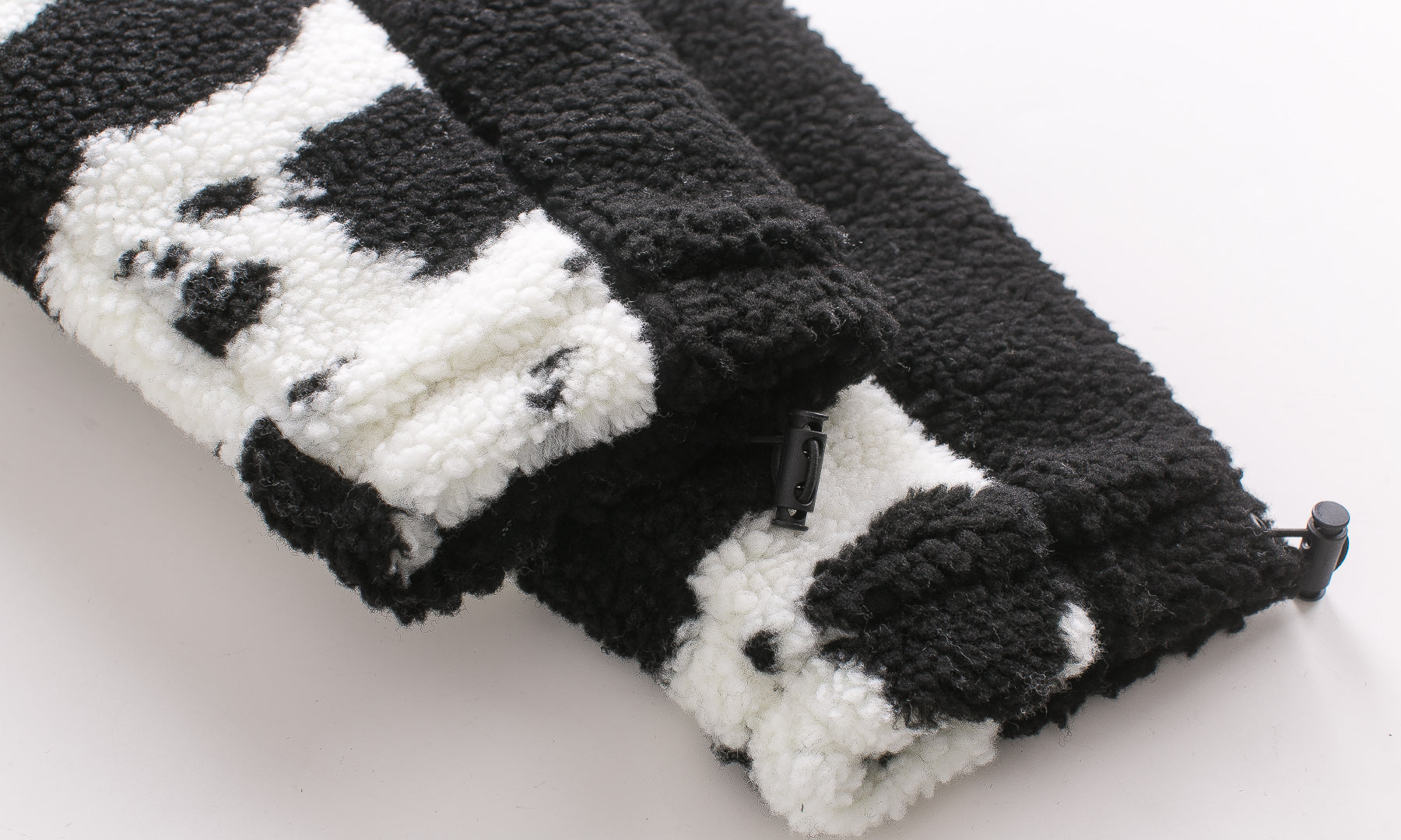Cow pattern road plush padded cotton clothing — scale reference