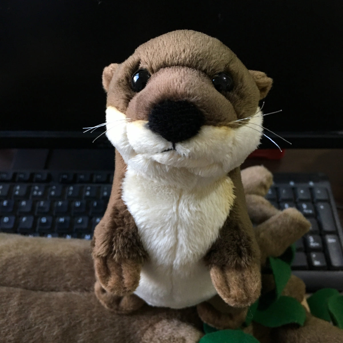 Mascot otter plush toy — back view