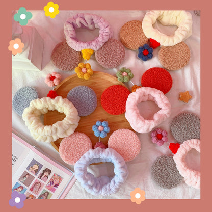 Small flower headband with cat ears — side view