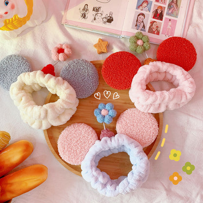 Small flower headband with cat ears — side view