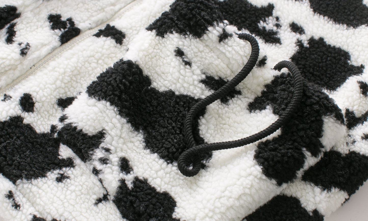 Cow pattern road plush padded cotton clothing — in use