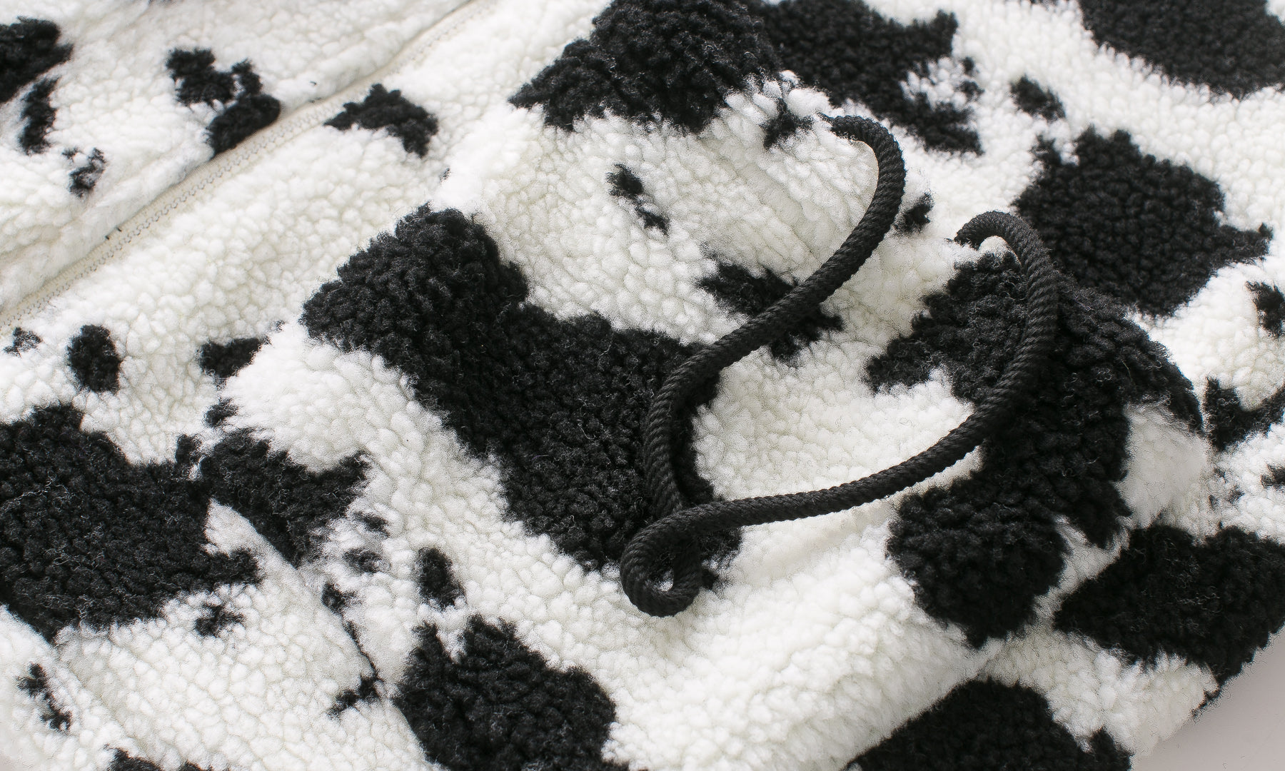 Cow pattern road plush padded cotton clothing — in use
