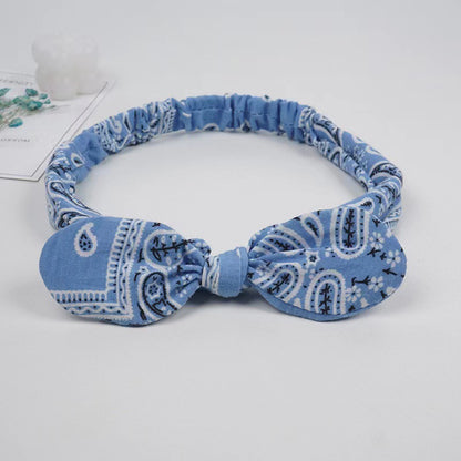 Bunny ears knotted elastic headband — scale reference