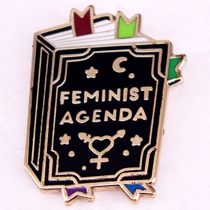 Book And Cup Hard Enamel Pin Fantasy Novel Badge — in use