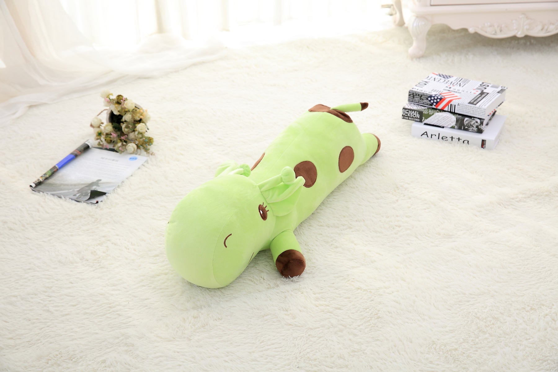 Giraffe plush toy — side view