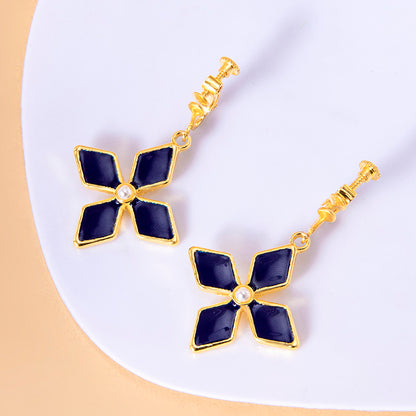 Genshin Impact Keqing Enamel Blue Geometric Flower Earrings — side view