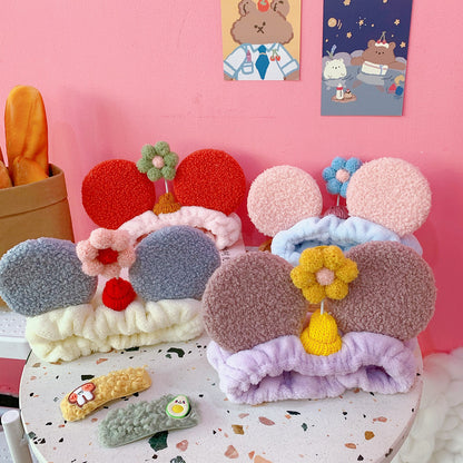 Small flower headband with cat ears — back view