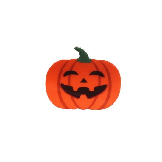 Picking And Playing With Funny Pumpkin Discs With Hair Clips — in use