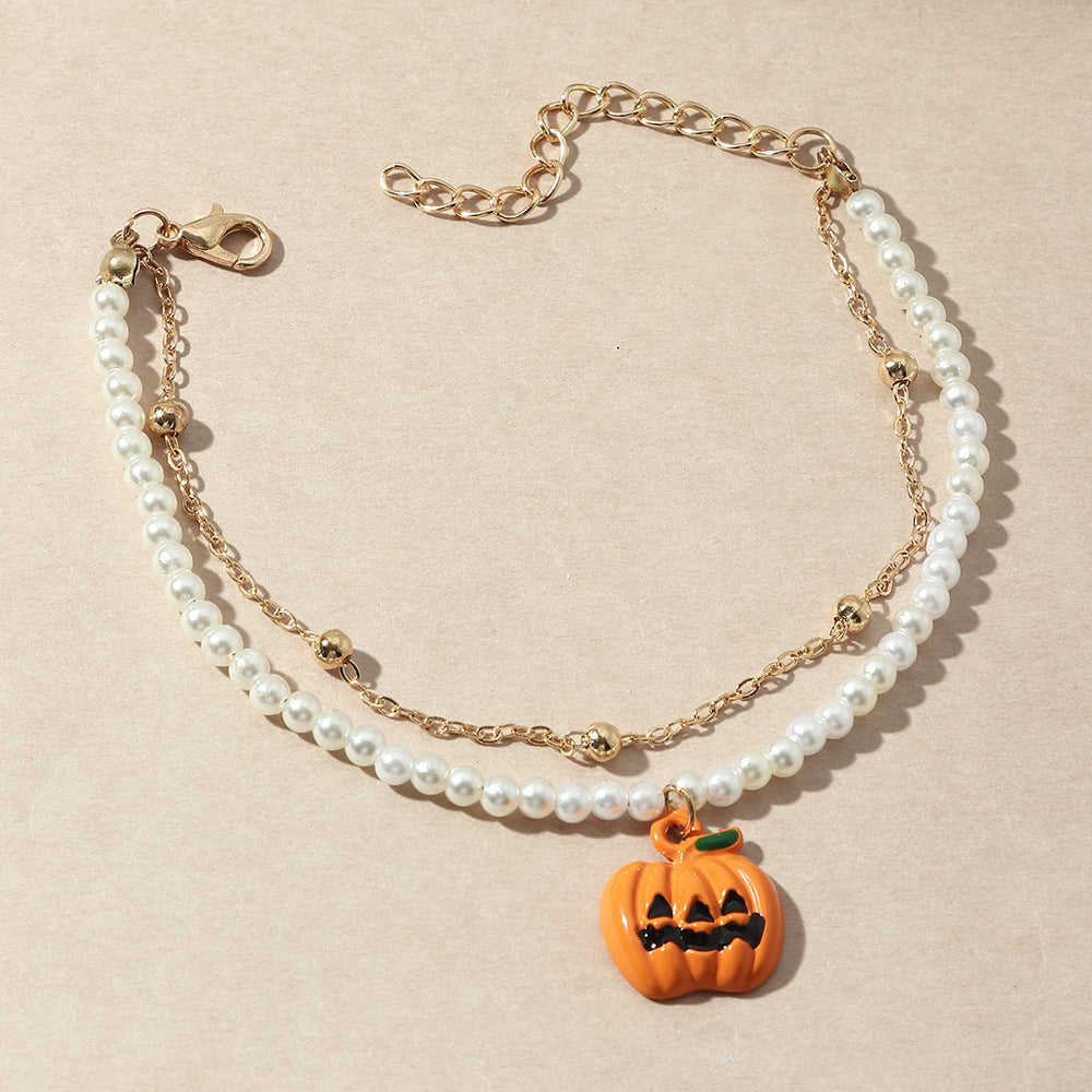 Halloween Gothic Jewellery 3-Piece — Vintage Skull Tassel Necklace, Imp Pearl Bracelet & Cartoon Pumpkin Bracelet — side view