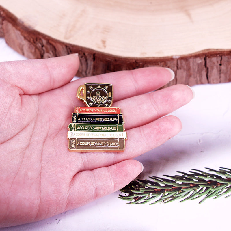Book And Cup Hard Enamel Pin Fantasy Novel Badge — side view