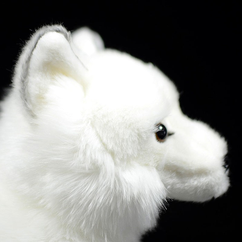 Arctic fox plush doll — in use