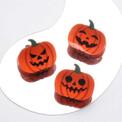 Picking And Playing With Funny Pumpkin Discs With Hair Clips — back view