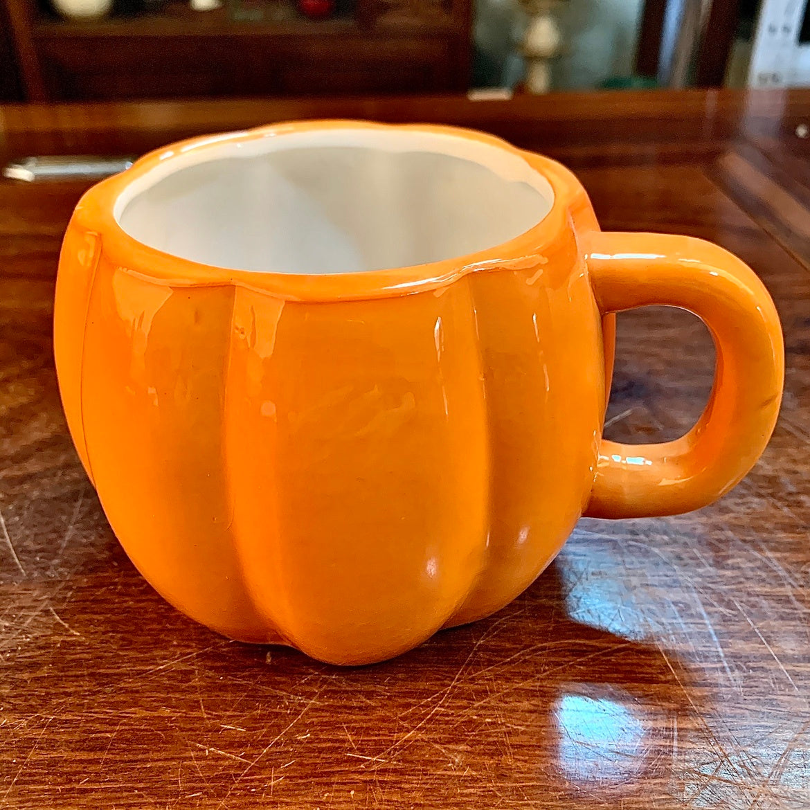 Ceramic Halloween Pumpkin Mug — in use