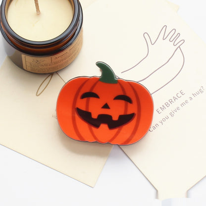 Picking And Playing With Funny Pumpkin Discs With Hair Clips — back view